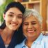 Nurse, elderly woman and portrait with smile in lounge for medicine, trust and assisted living. Sen.